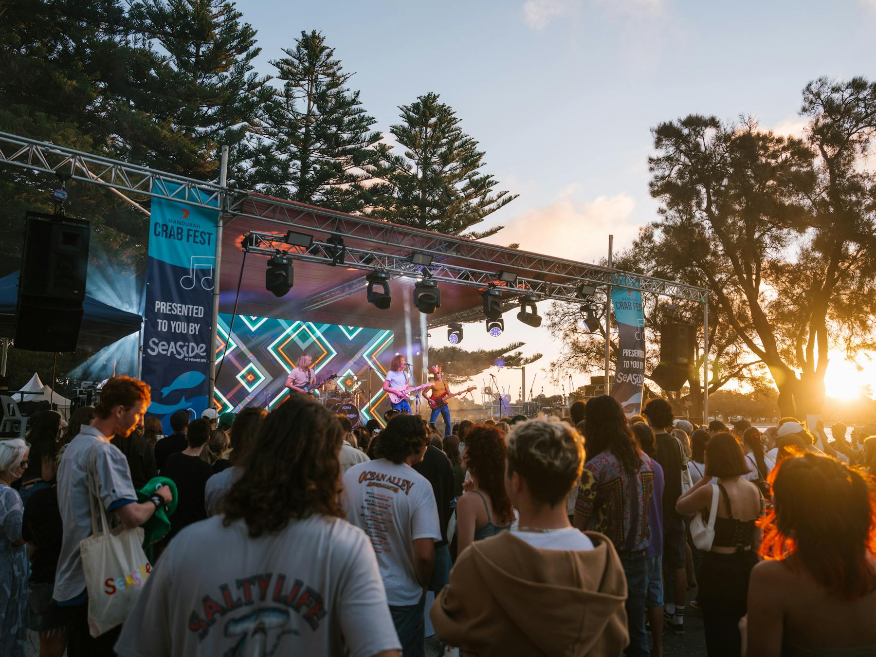 Music stage with large crowd