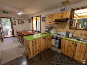 The kitchen has many essential appliances, utensils and cooking aids