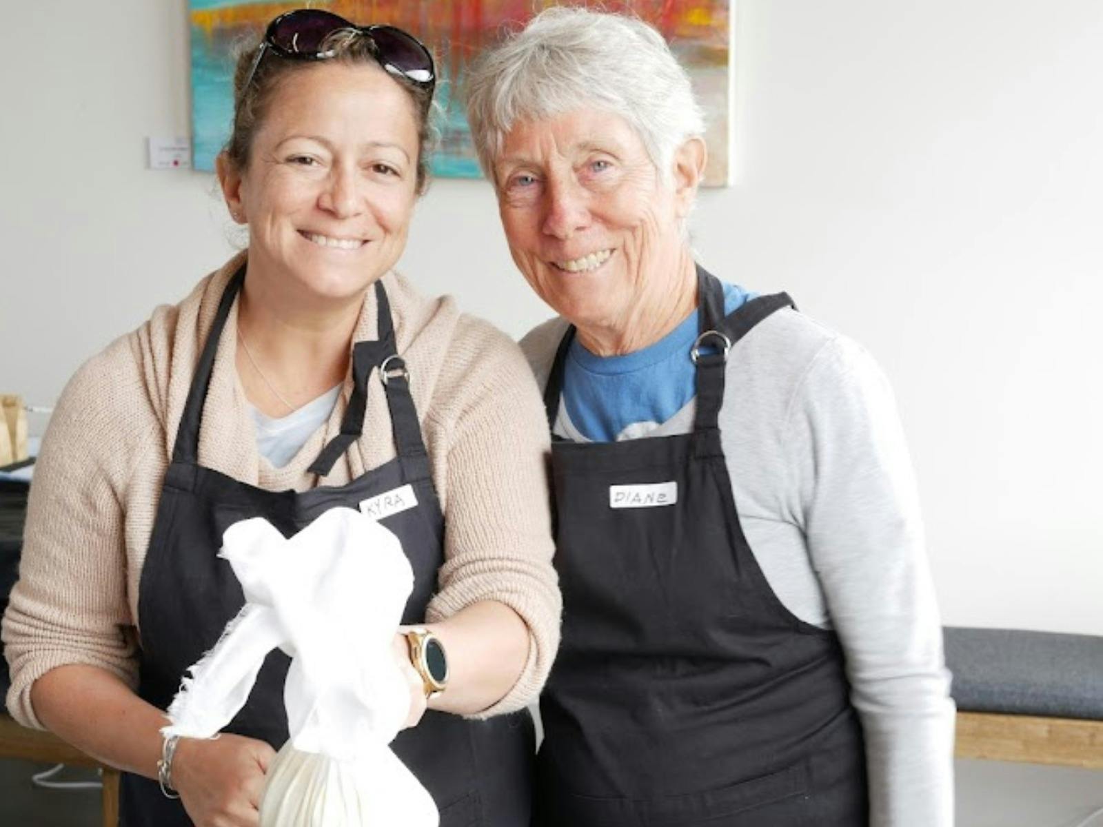 2 Ladies enjoying a cheese making class