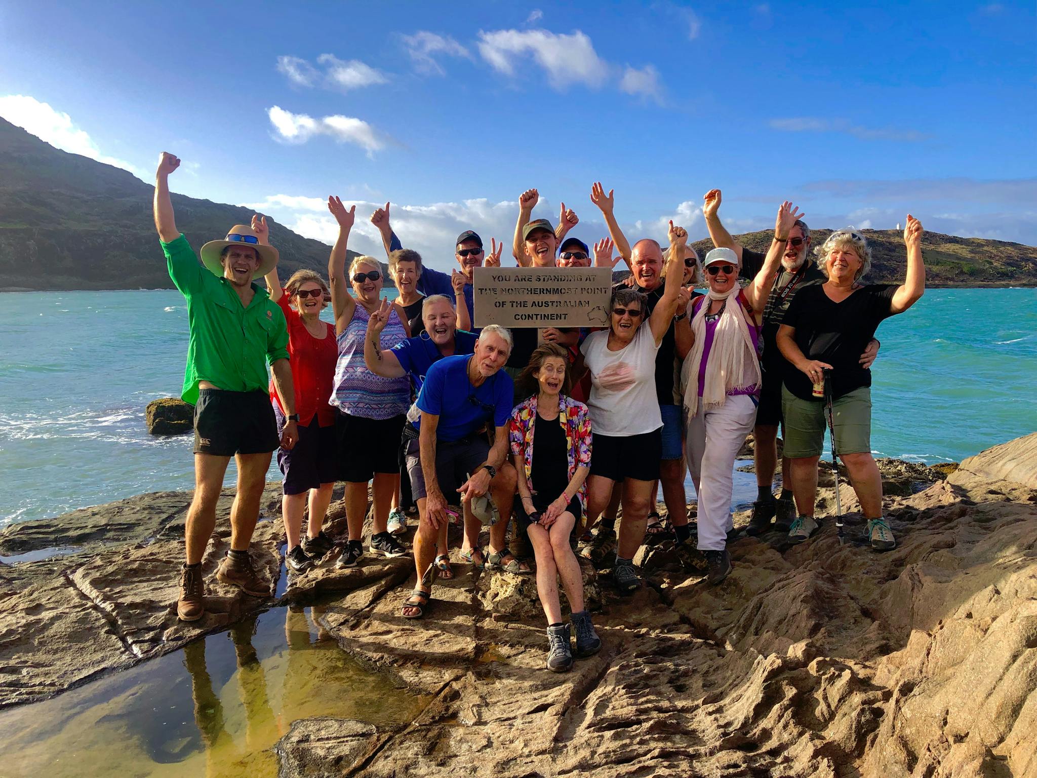 group of people at tip of australia group of people at tip of australia