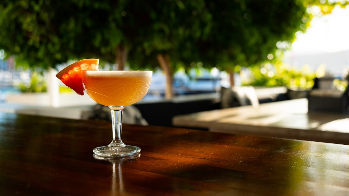 photo of grapefruit sour cocktail at The Garden Bar, Airlie Beach