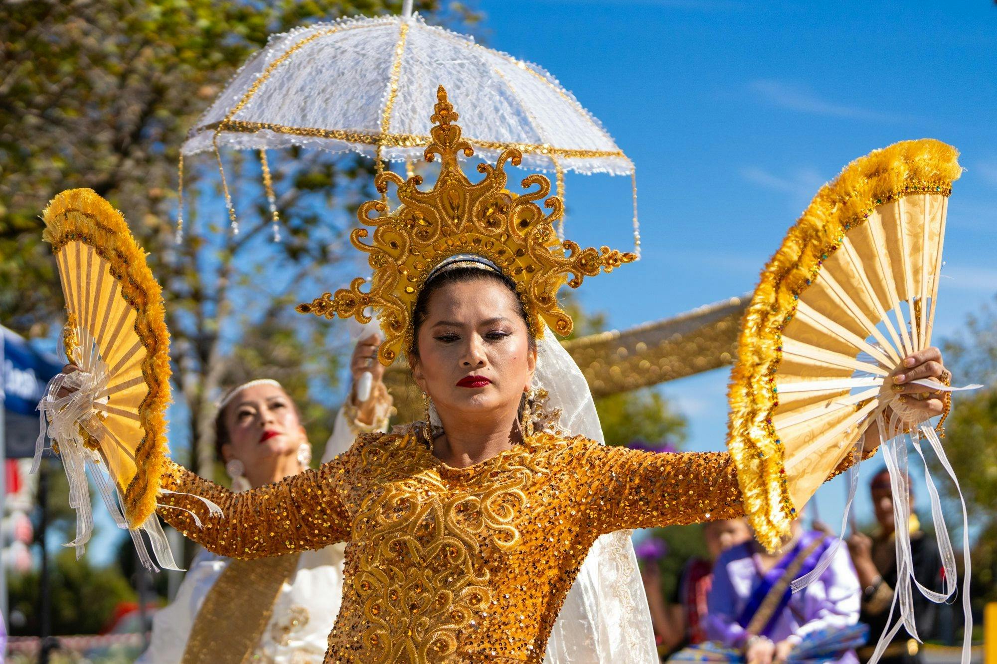 Woman performing in traditional clothing