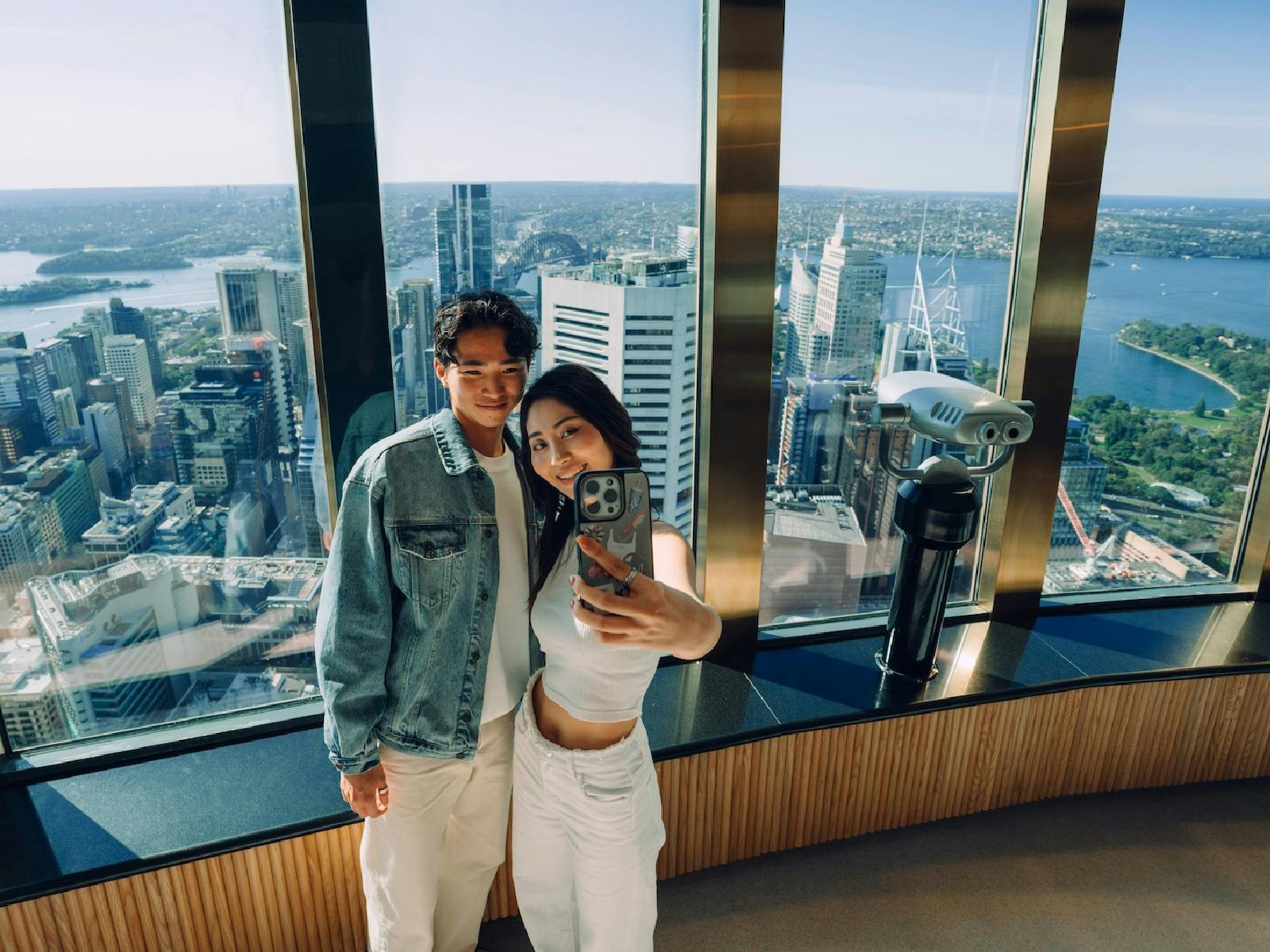 Guests taking a seifie from the Observation Deck at Sydney Tower Eye