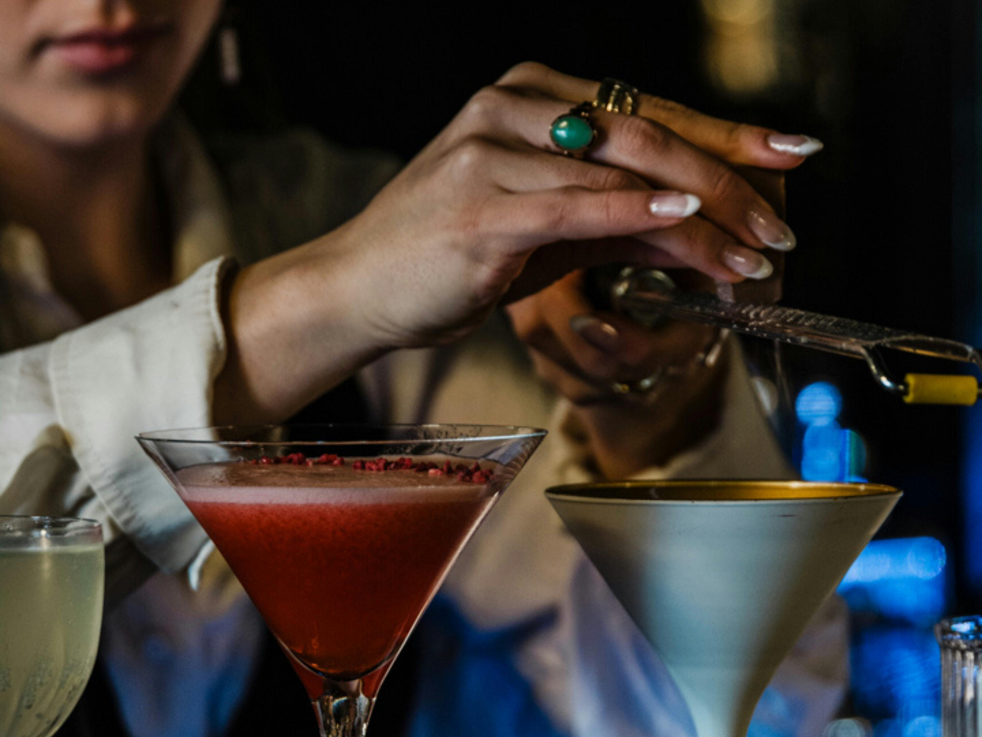 Mixologist preparing drinks