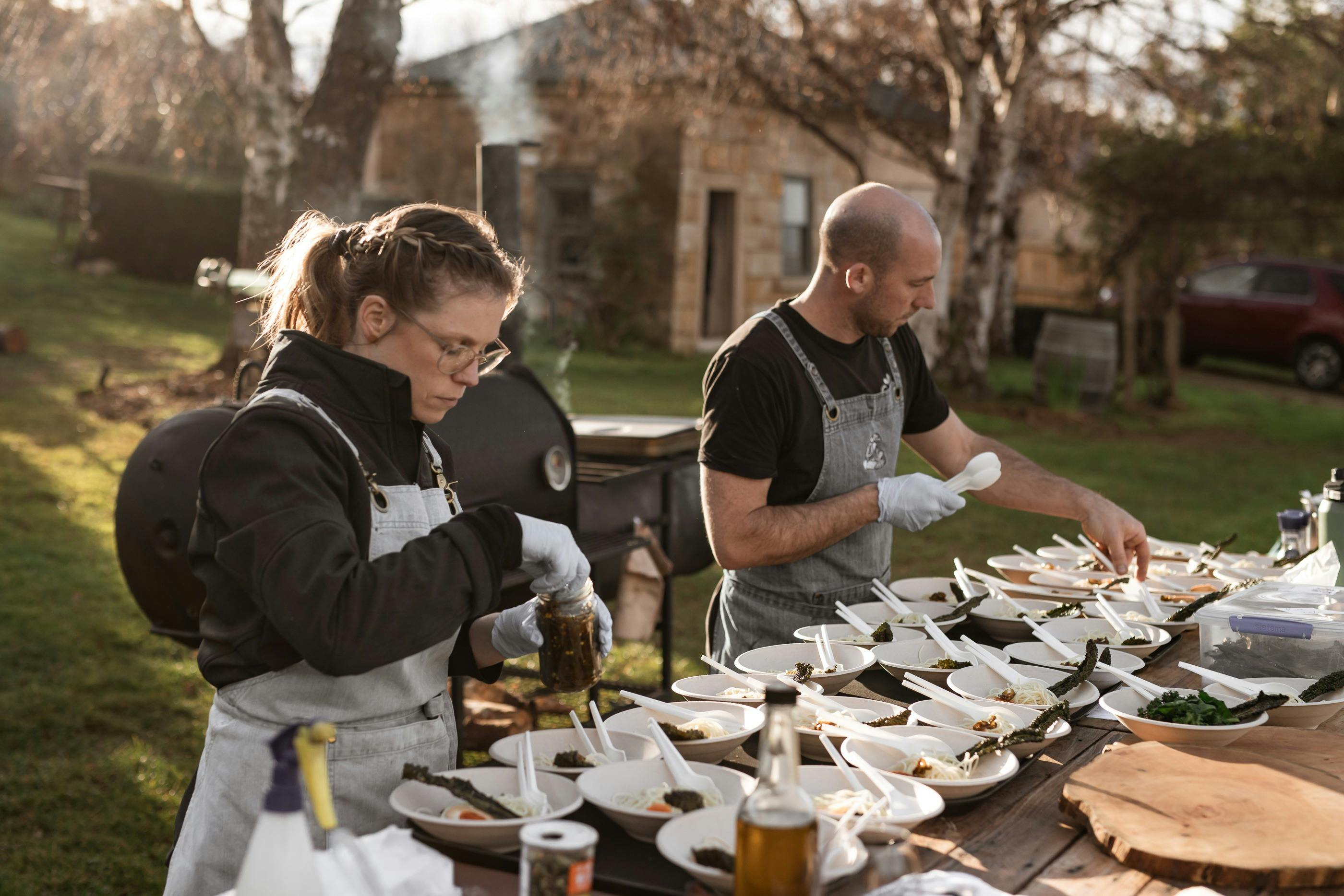 Paul and Sara serving plates