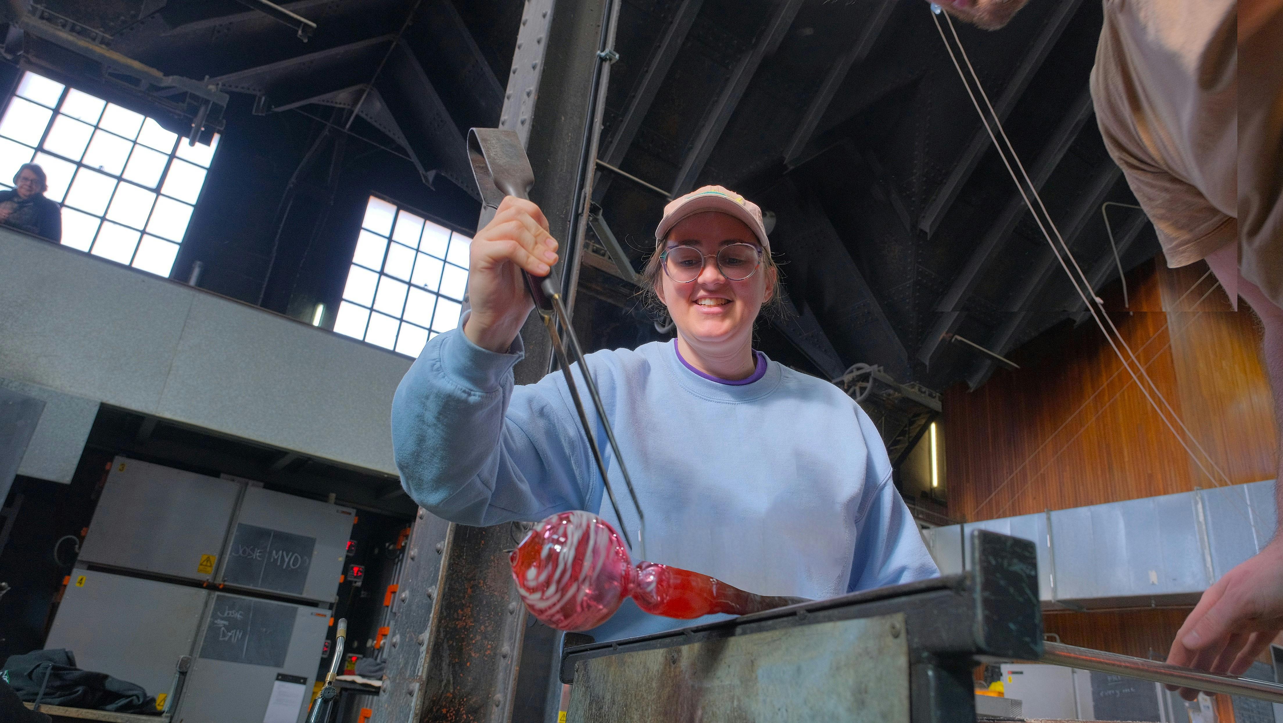 Participant glass blowing in MYO class