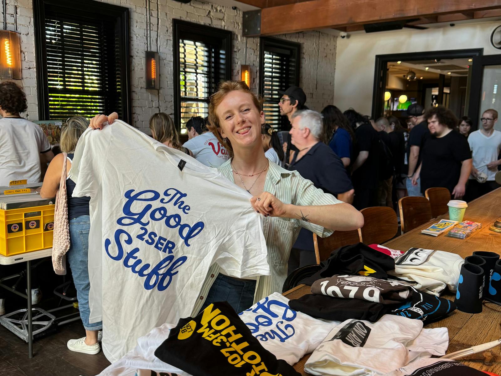 2SER merch table