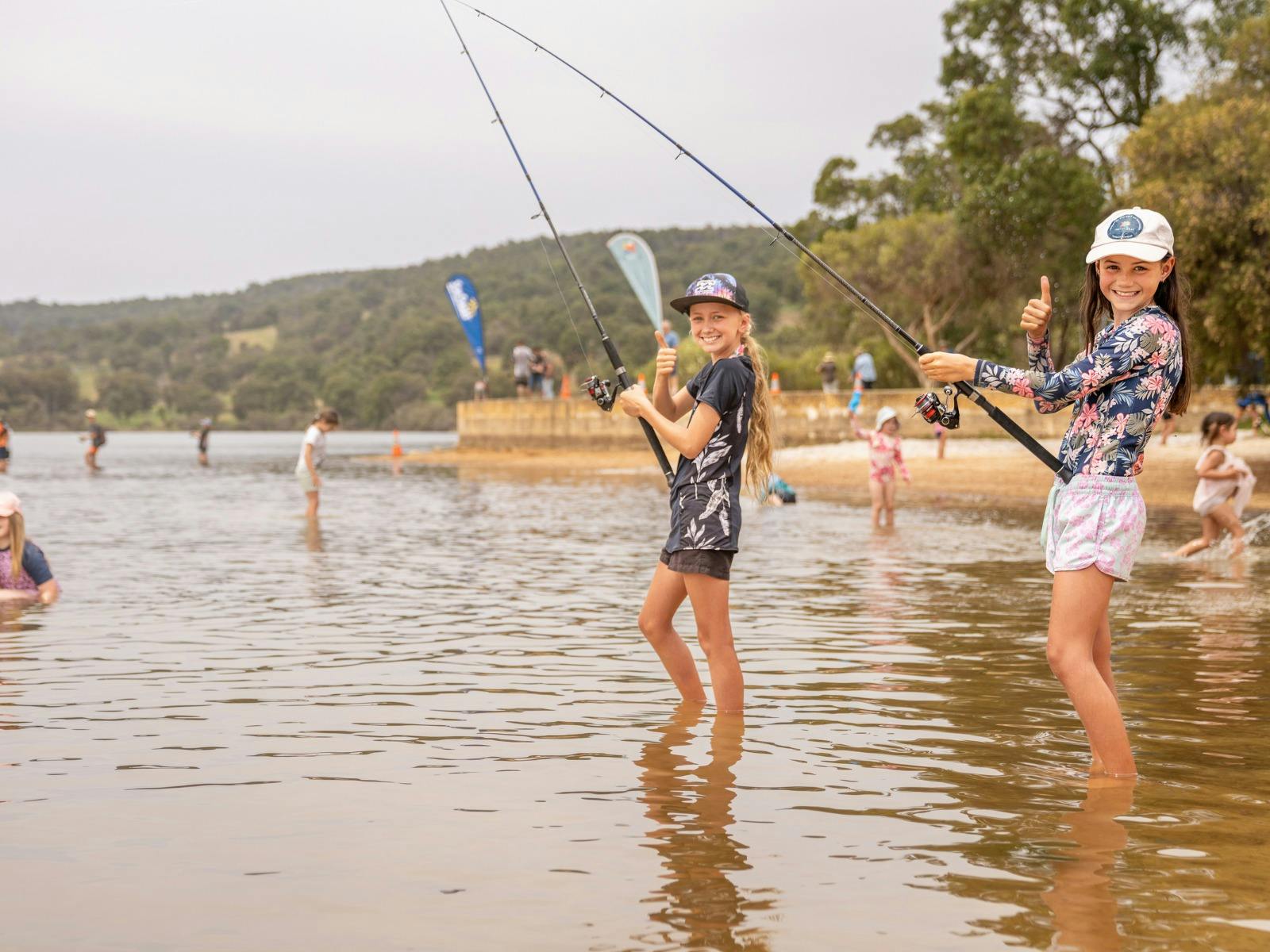 Girls fishing at Troutfest