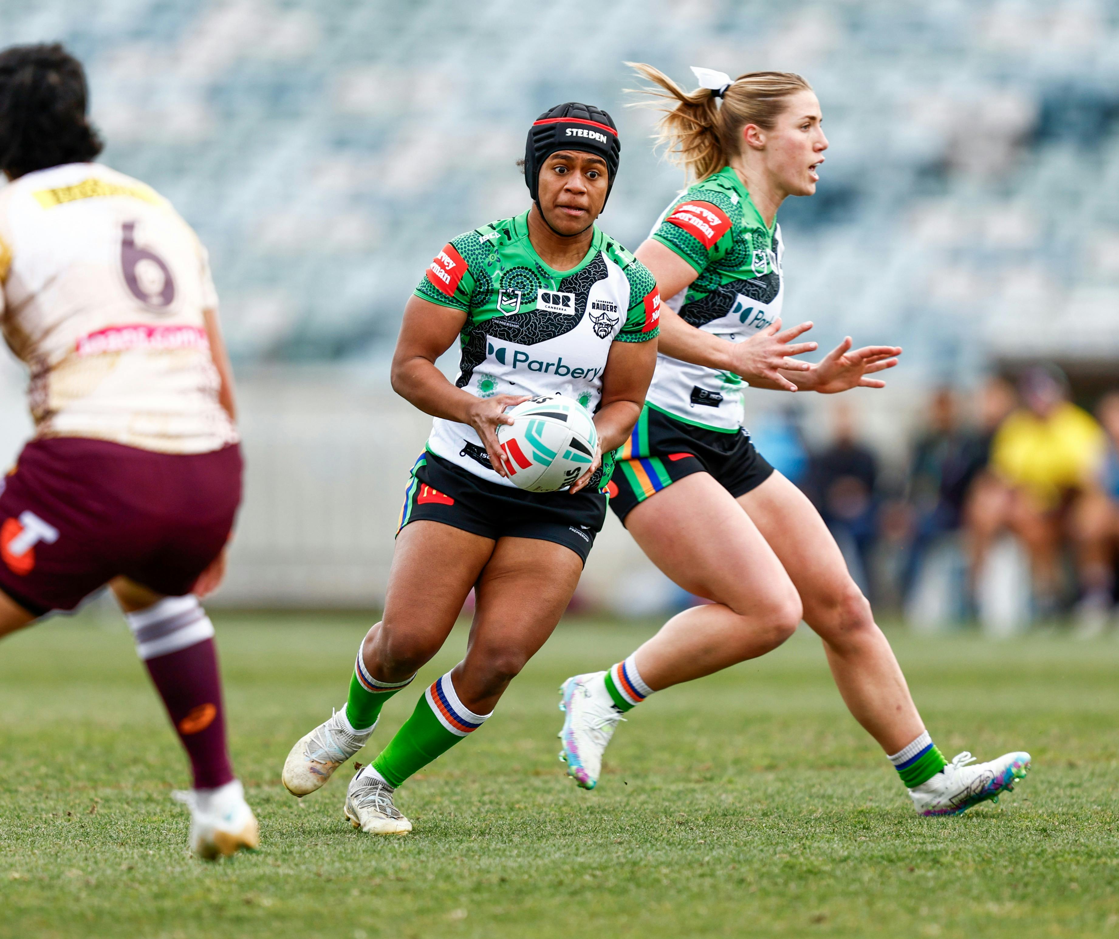 Canberra Raiders NRLW player Sereana Naitokatoka running the ball.
