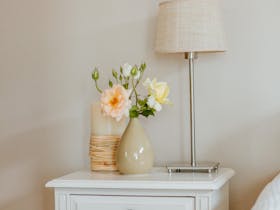 Bedside table with fresh flowers