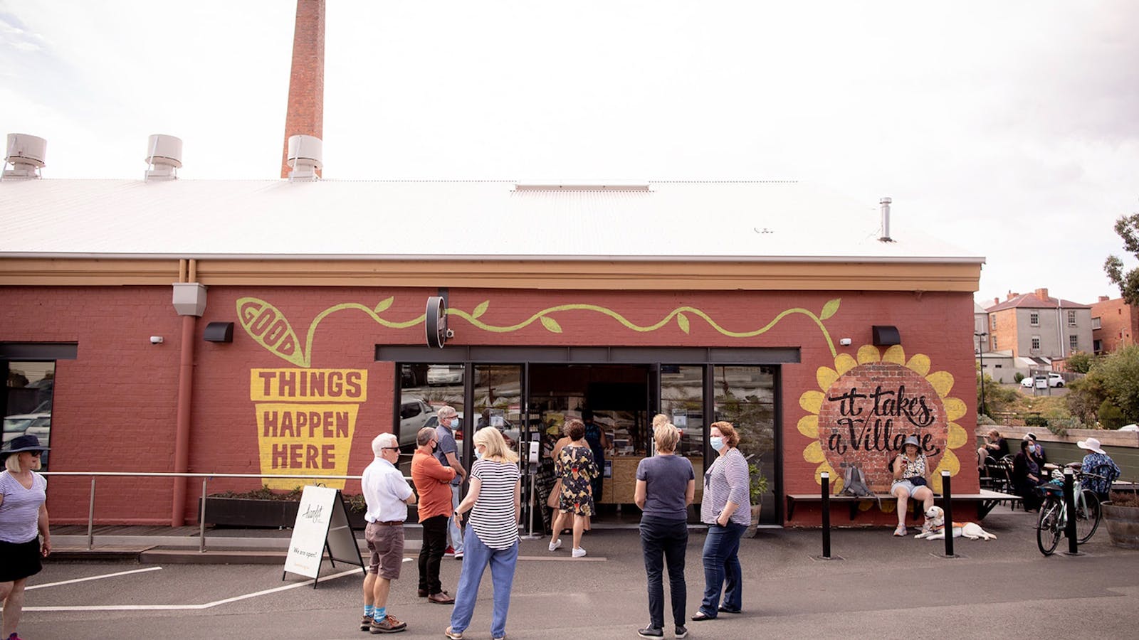 Group of people standing outside Hamlet Cafe