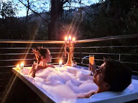Private and romantic, this hot bath on the back deck is the perfect relaxing end to the day
