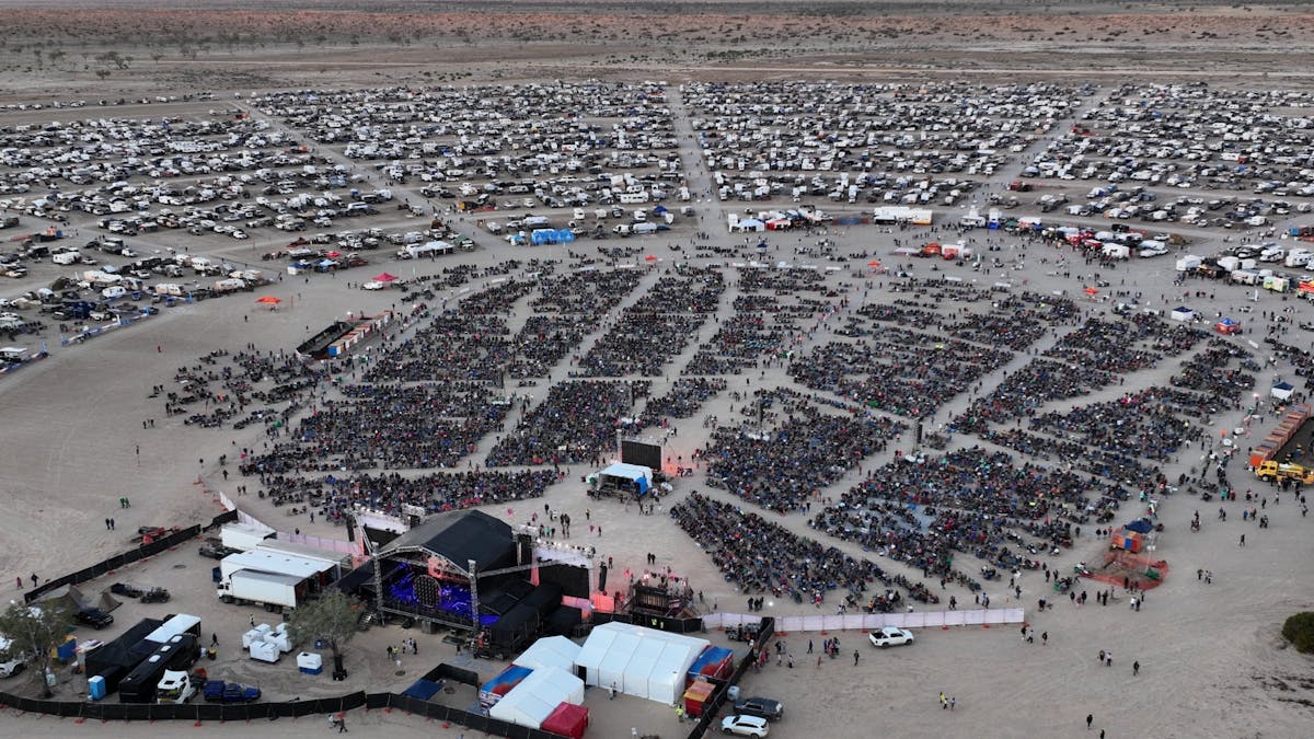 Concert crowd enjoying live music at the Birdsville Big Red Bash, Simpson Desert