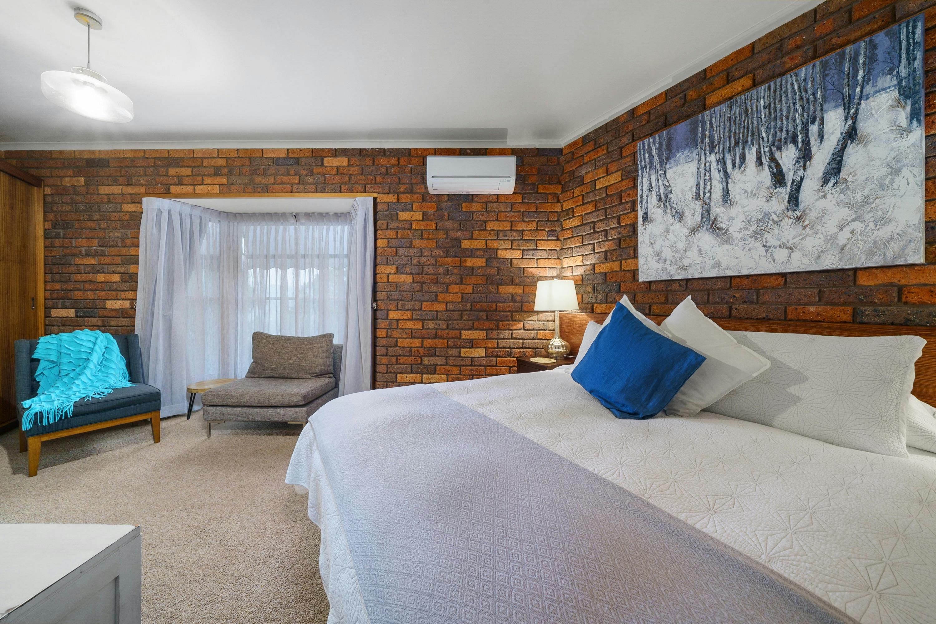 Cosy room with TV and split system air conditioner