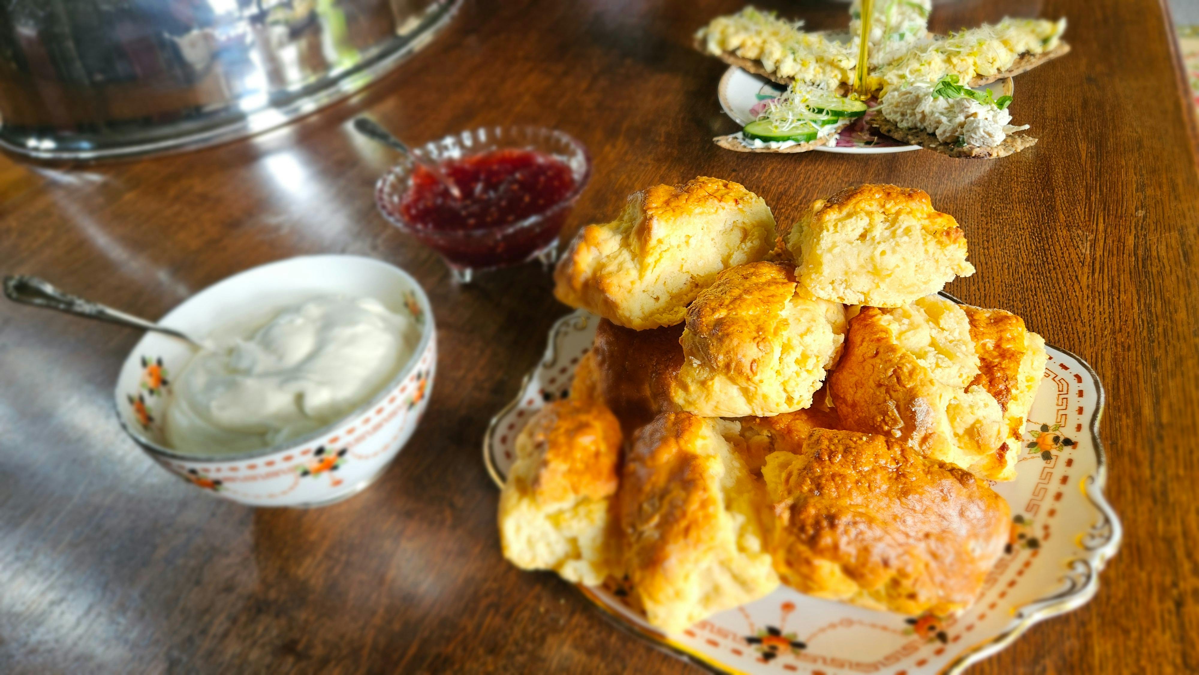 Warm scones with cream and jam, and finger sandwiches, served as part of the Yallum Park high tea