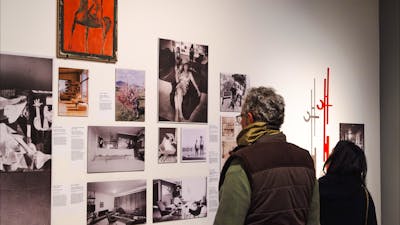 People exploring the Taglietti Exhibition