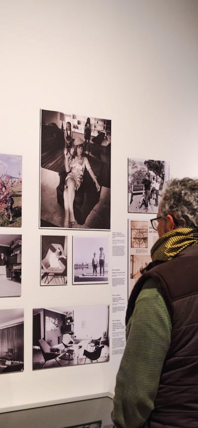 People exploring the Taglietti Exhibition