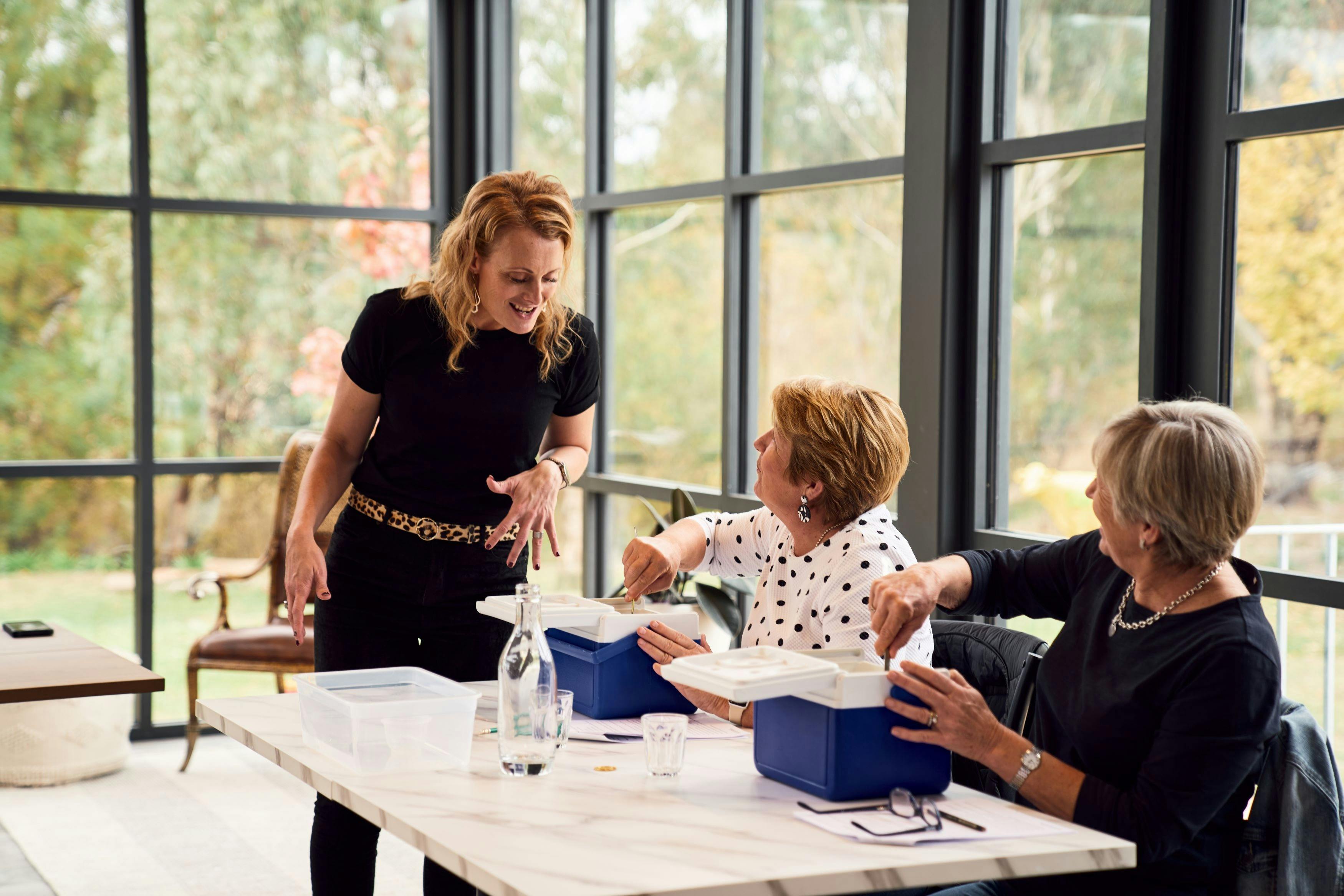 Sheree talking with students