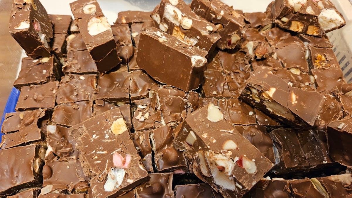 One of our most popular lines, packed with nuts, coconut, marshmallows and coconut. One of our most popular lines, packed with nuts, coconut, marshmallows and coconut.