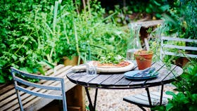 little kitchen garden thrives in the warmer months with all sorts of herbs, vegetables and flowers