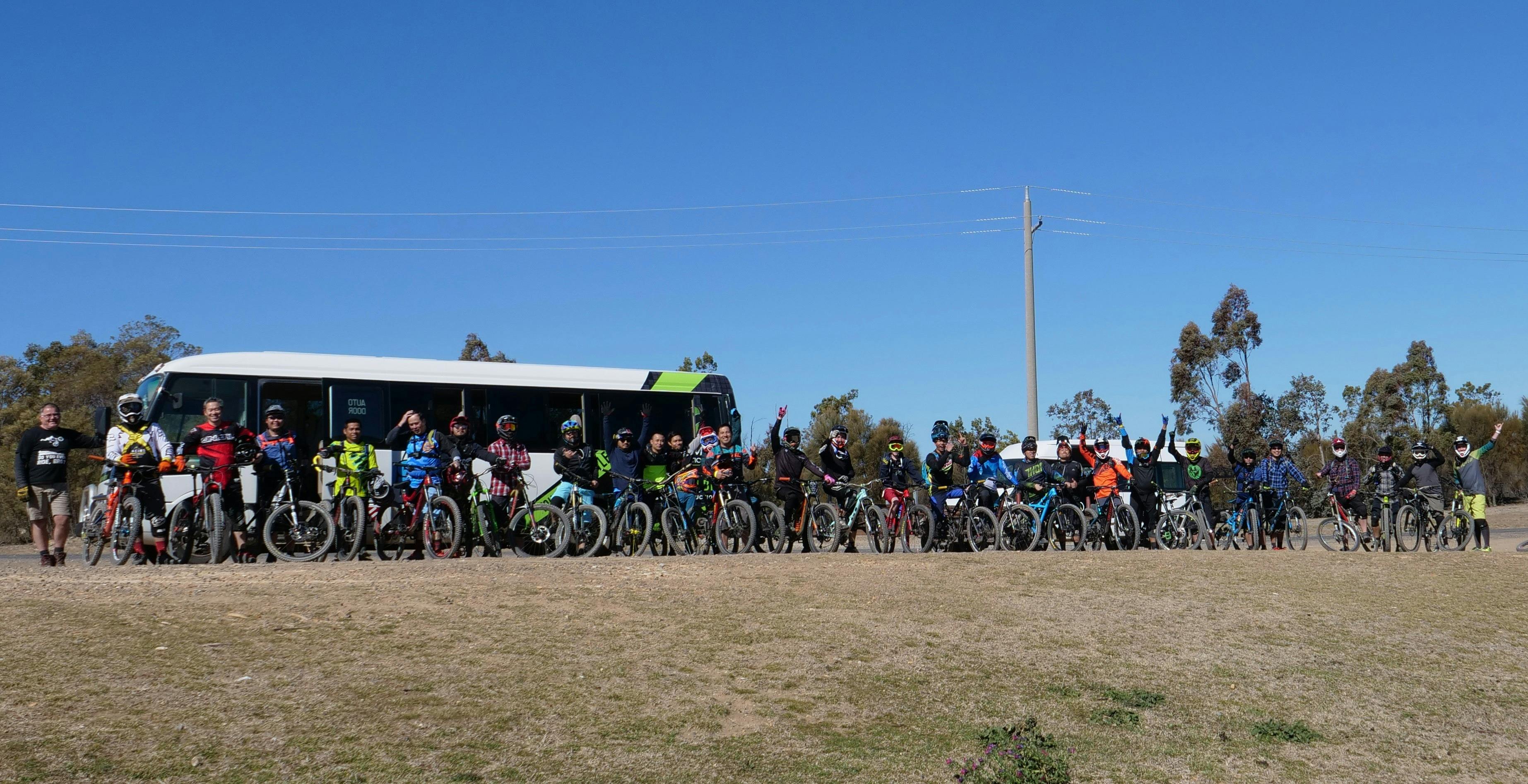 People standing in front of shuttle bus