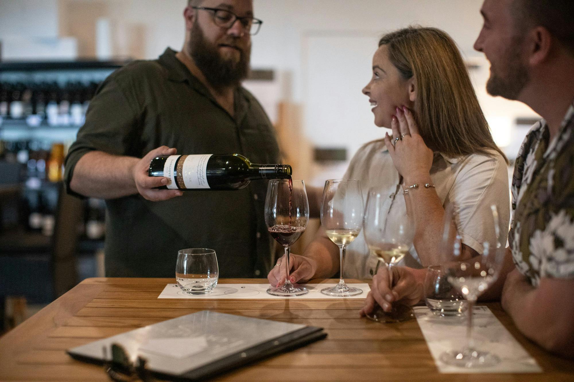 Couple experience a Wine House tasting