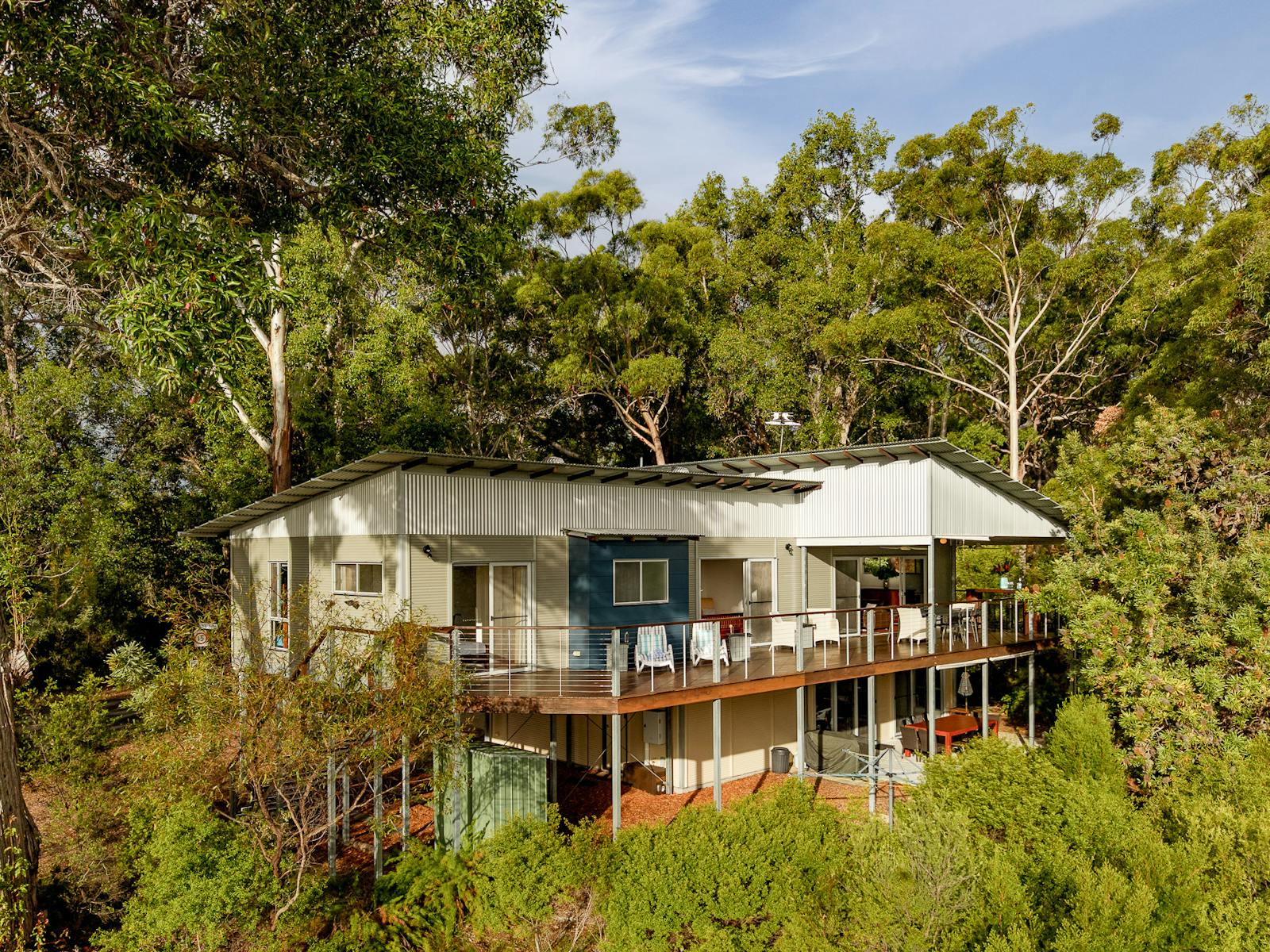 Expansive 18m entertaining deck with outdoor dining and seating, spectacular sunset and water views Expansive 18m entertaining deck with outdoor dining and seating, spectacular sunset and water views
