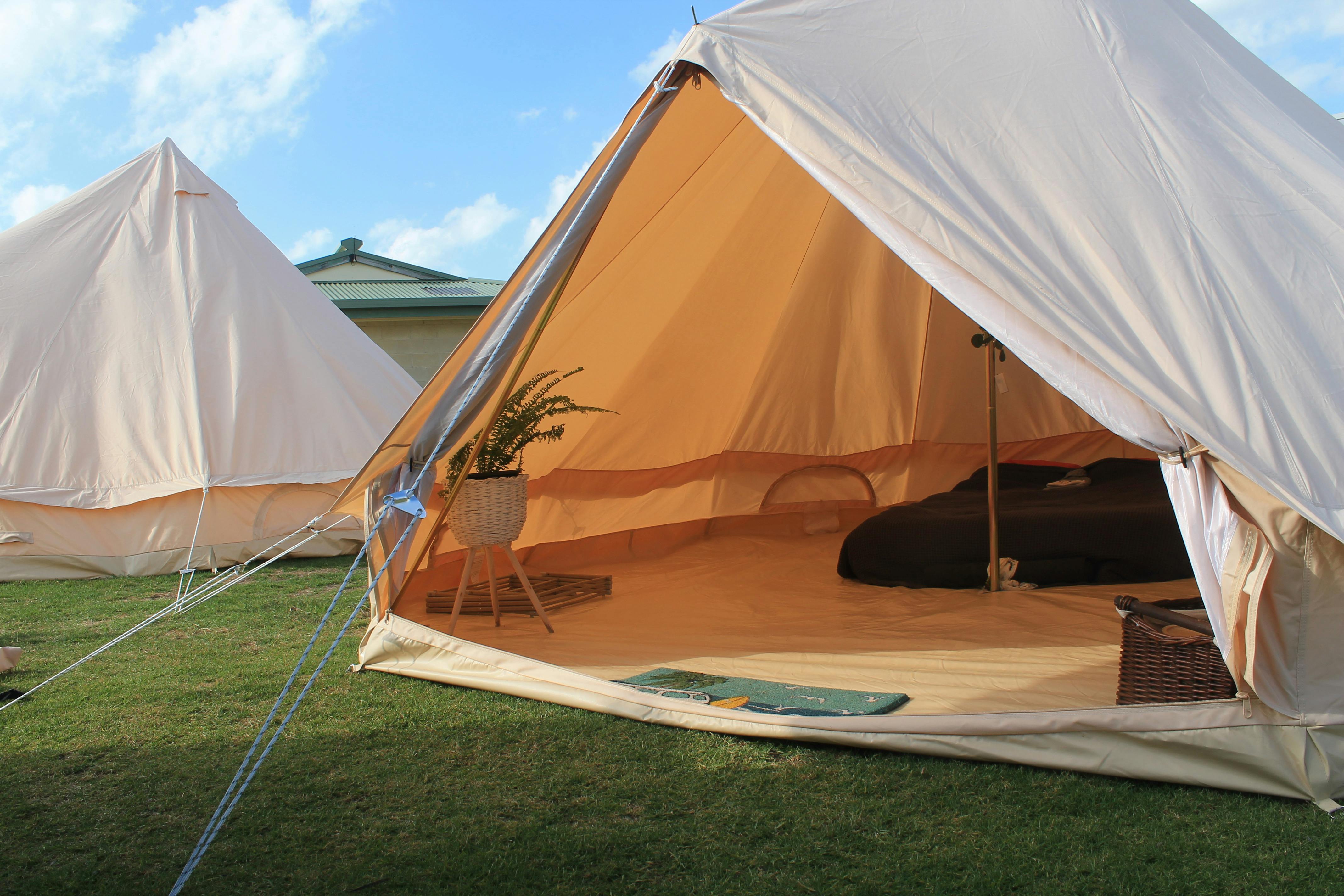 Our big beautiful bell tents set up with everything you need to make your stay cosy and comfortable.
