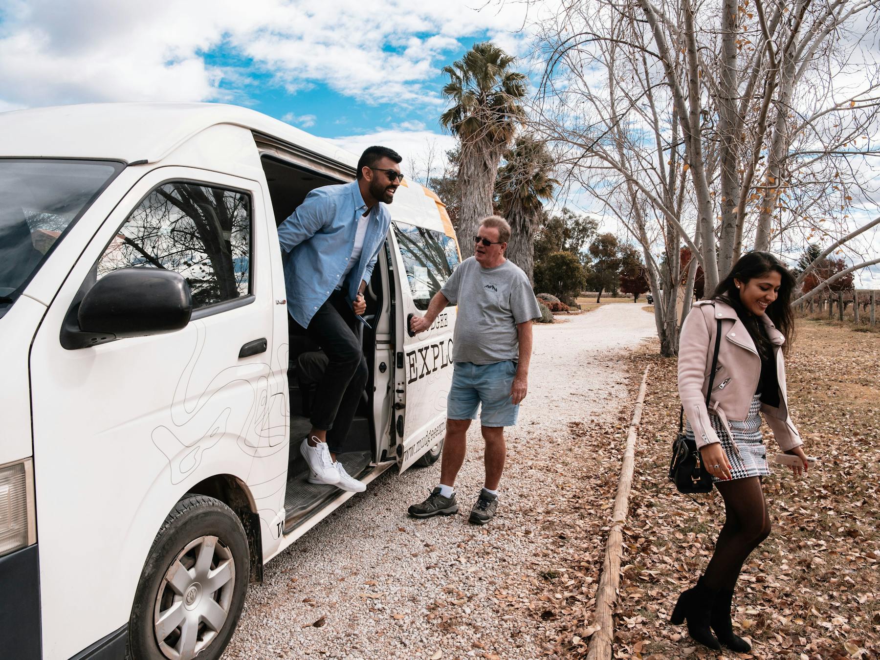 Couple jumping out of bus