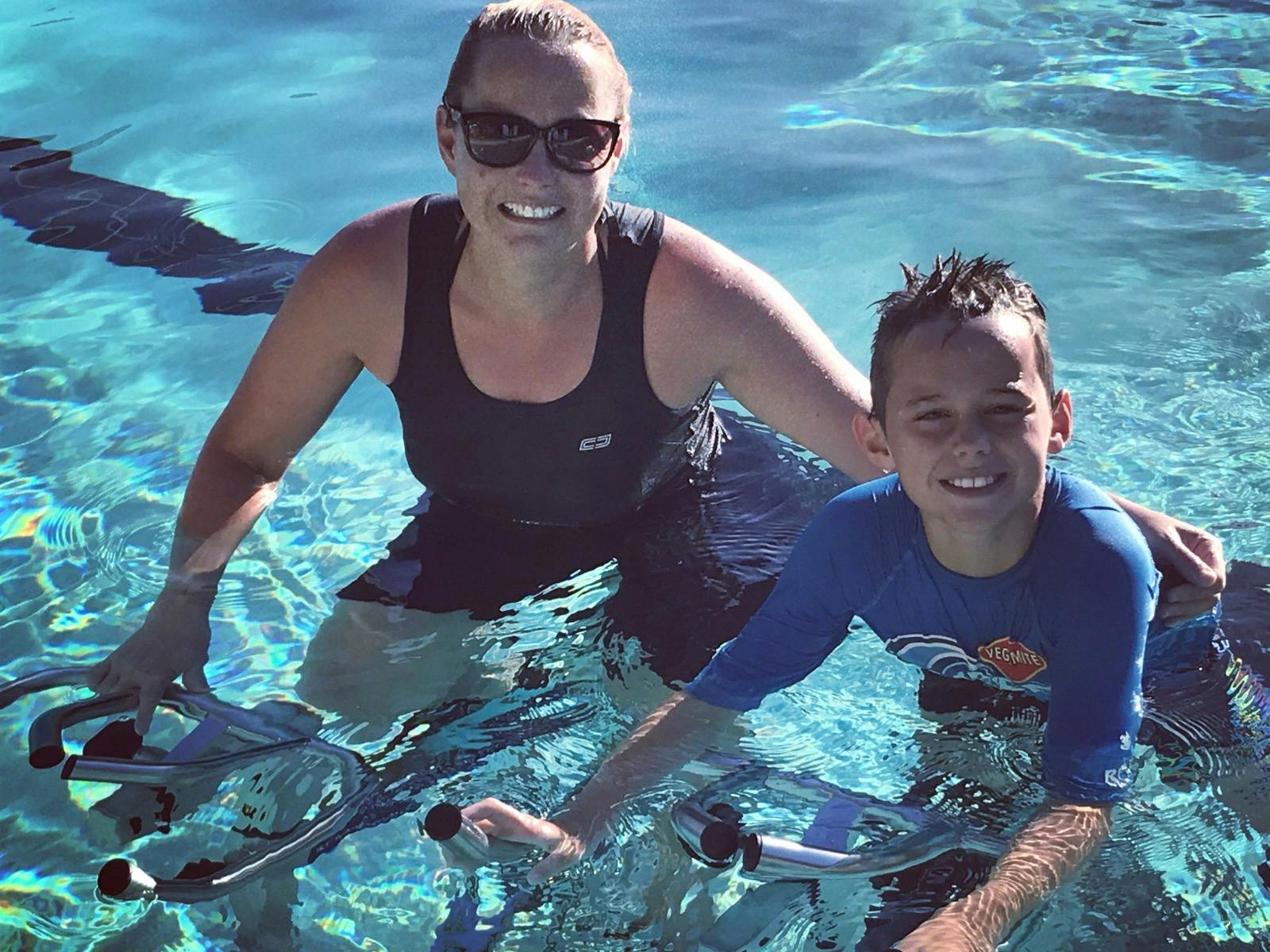 Mother and child water cycling