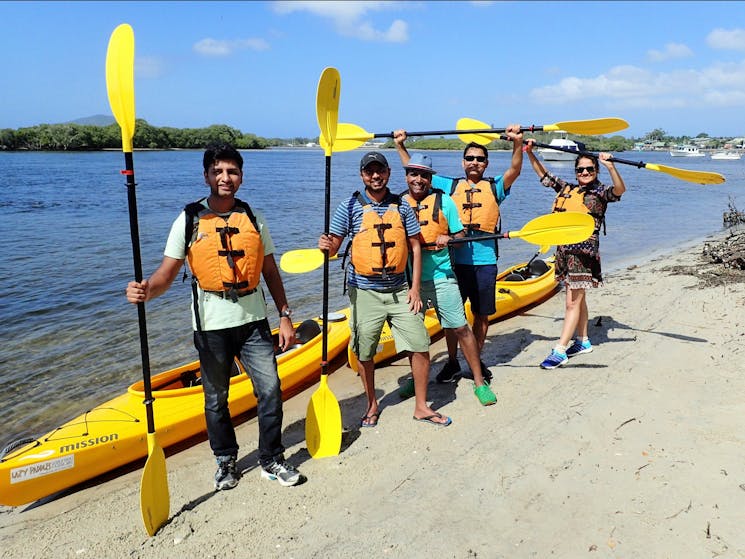 Tour group on beach during guided kayak tour with Lazy Paddles