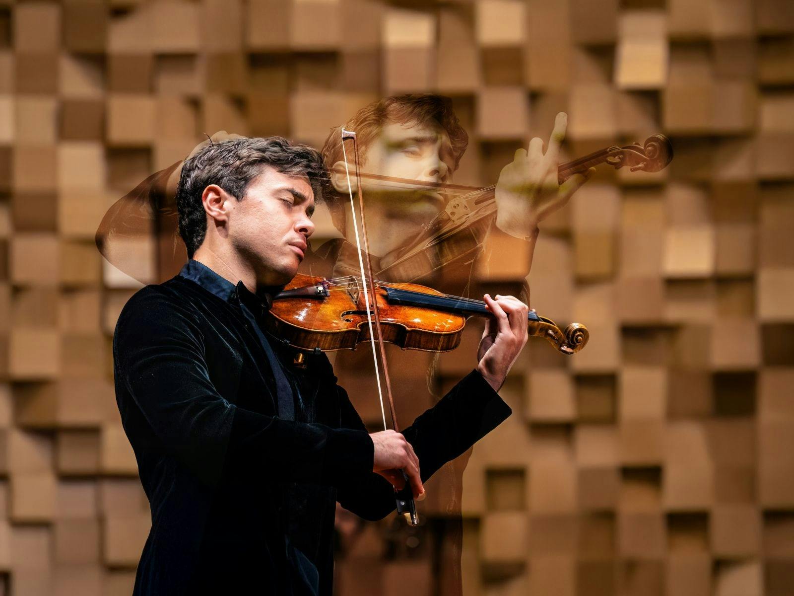 A man playing a violin