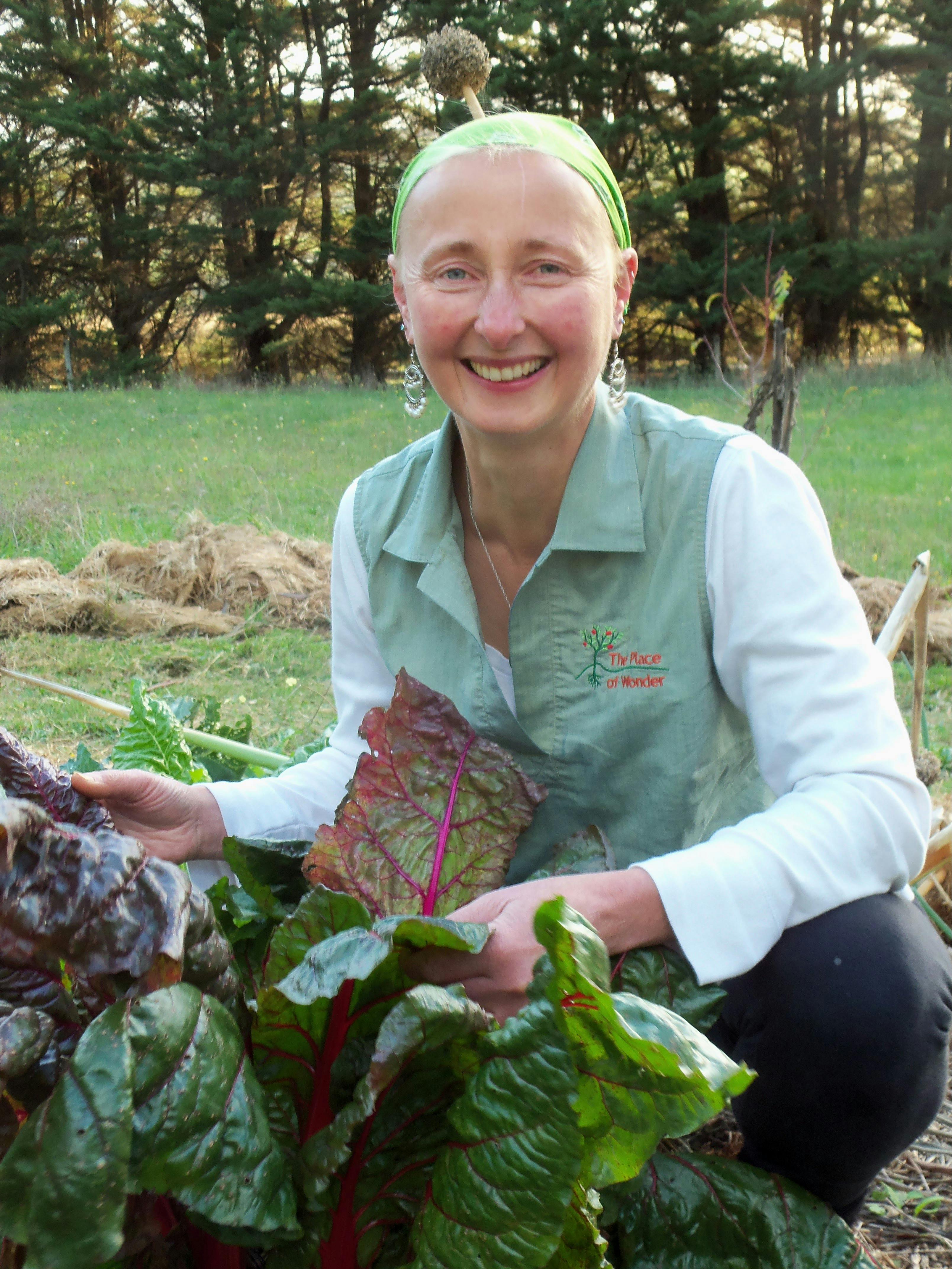 Kylie sourcing seasonal produce from The Place of Wonder permaculture garden