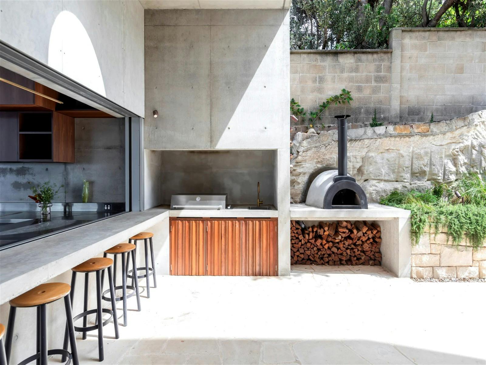 Rustic stone fire pit with crackling flames and rustic charm