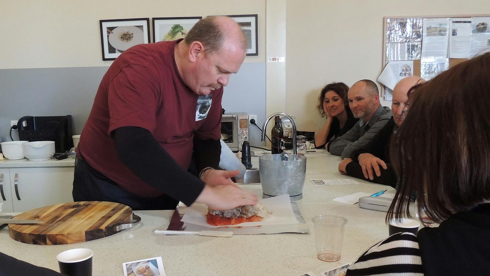 Chef John constructing a Eucumbene truffle trout roulade