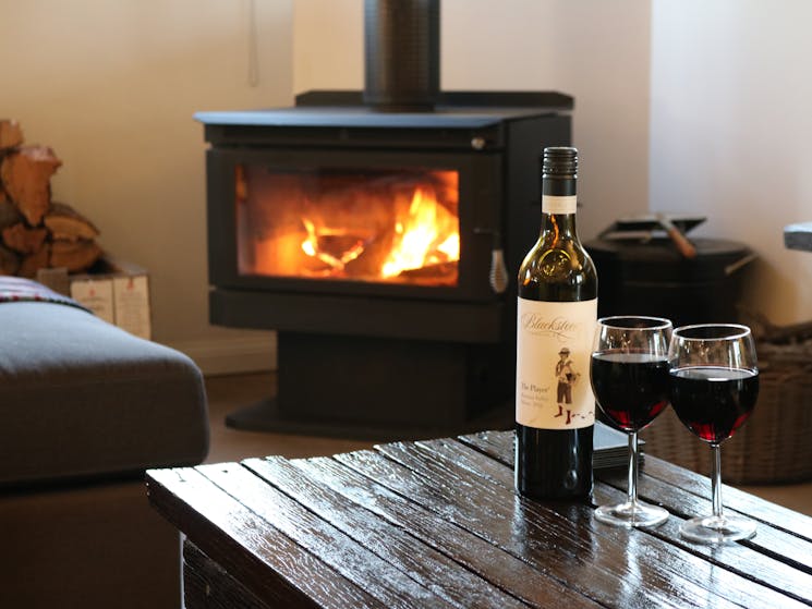 Enjoy a wine or two in front of a cosy fire
