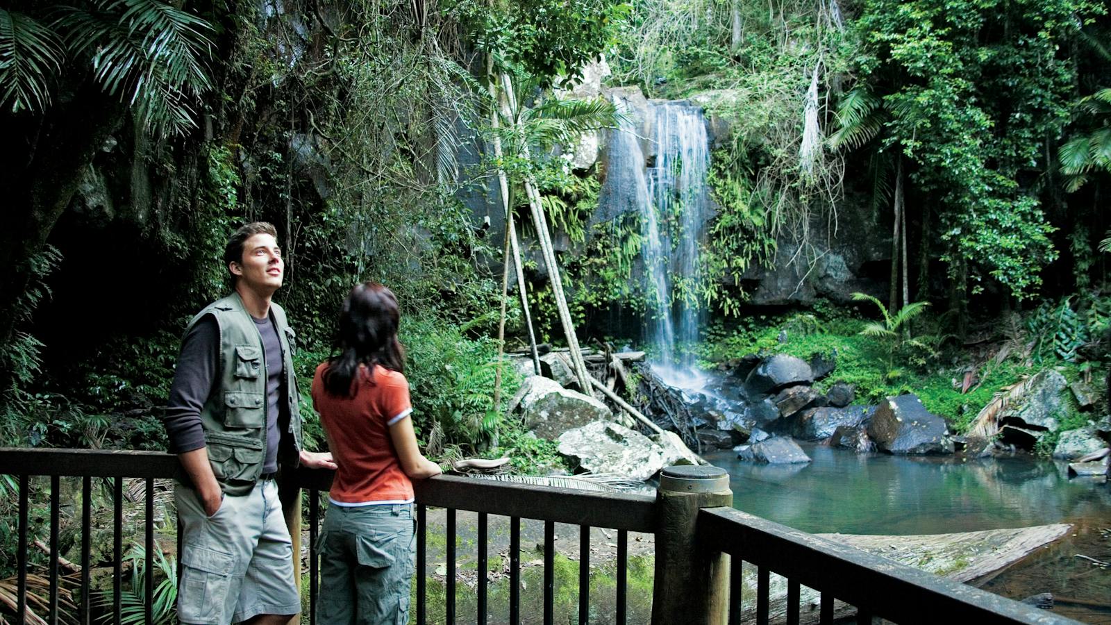 Couple at viewing deck at base of Curtis Falls.