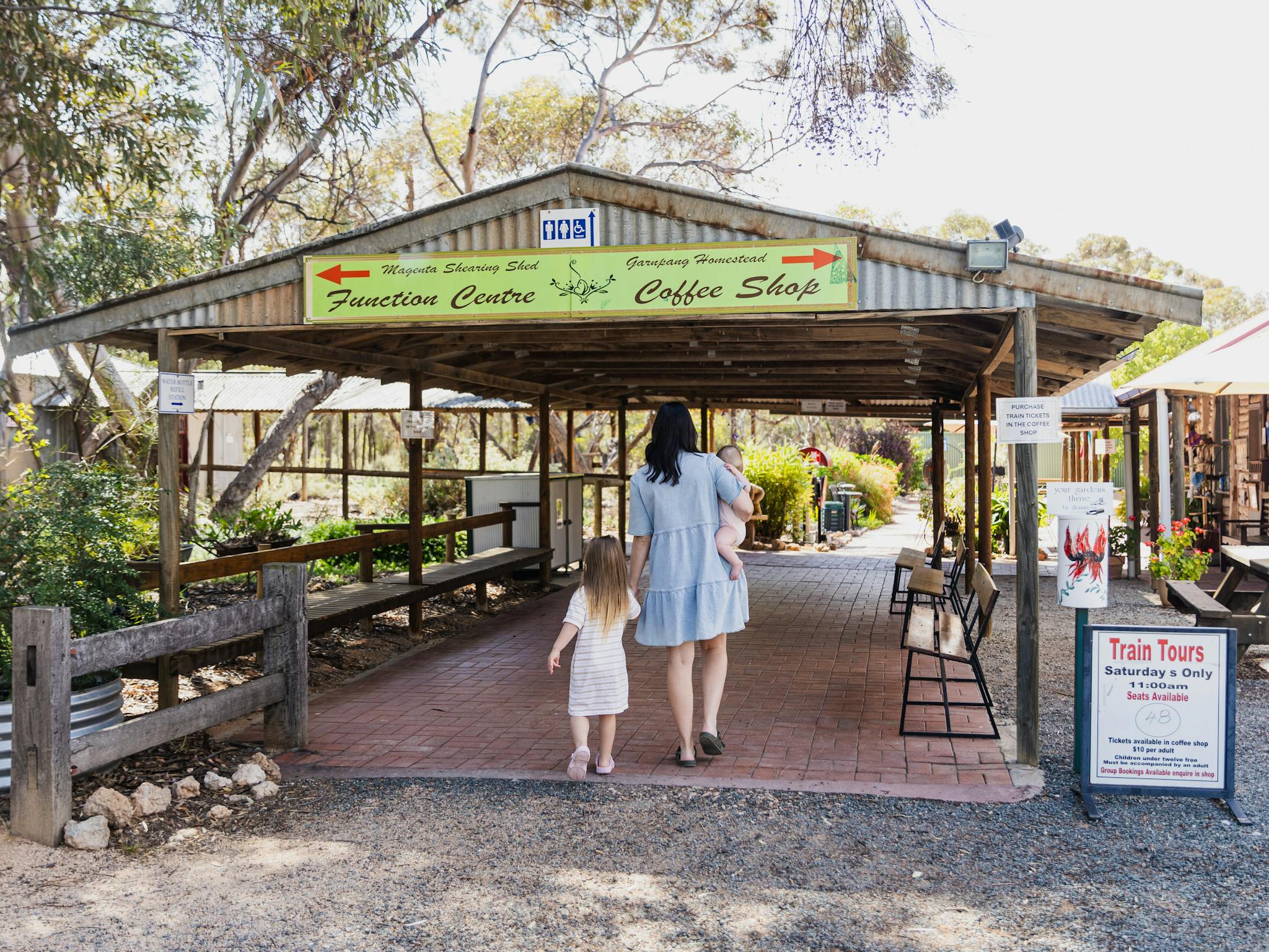 Mum and Daughter going into cafe