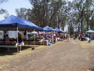 These are a few stalls at the Cabarlah Market, in a rural setting.