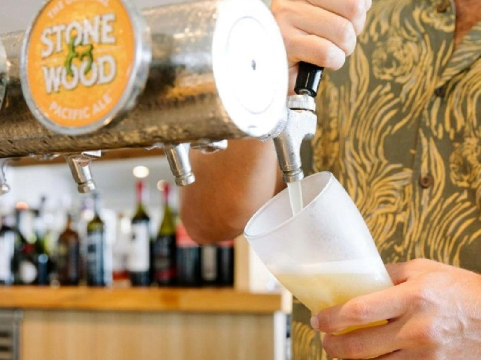 Image of a bartender pouring a Stone & Wood beer