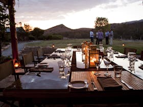 Dining around old wool classing table