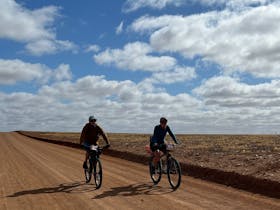Bike riders in desert area
