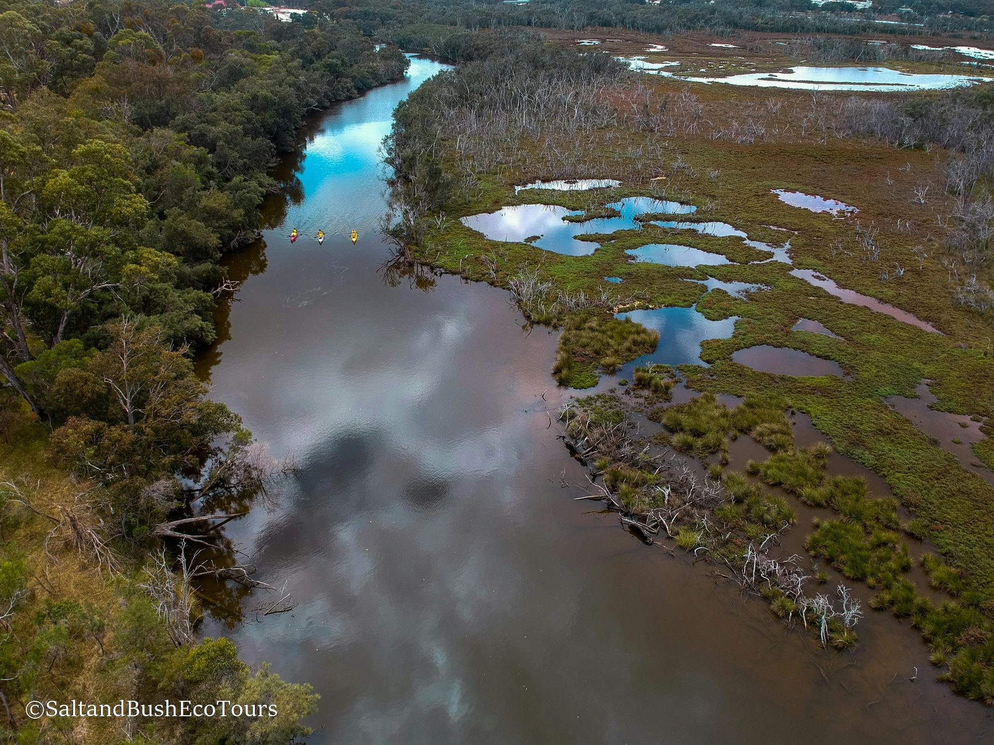 Beautiful view from above river and three kayaks