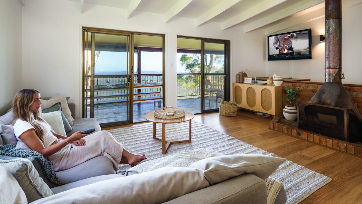Living room with view and a fireplace