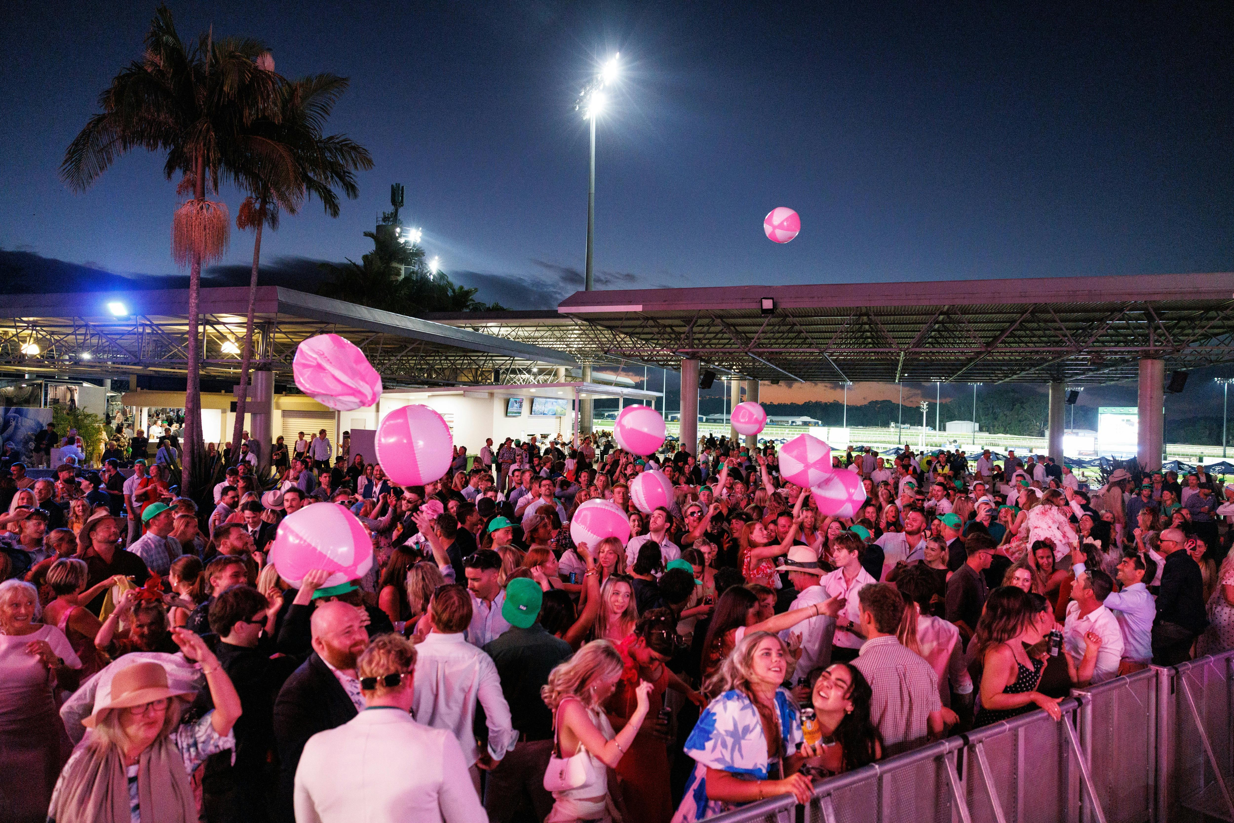 Crowd enjoying live music and entertainment at the Sunshine Coast Turf Club.