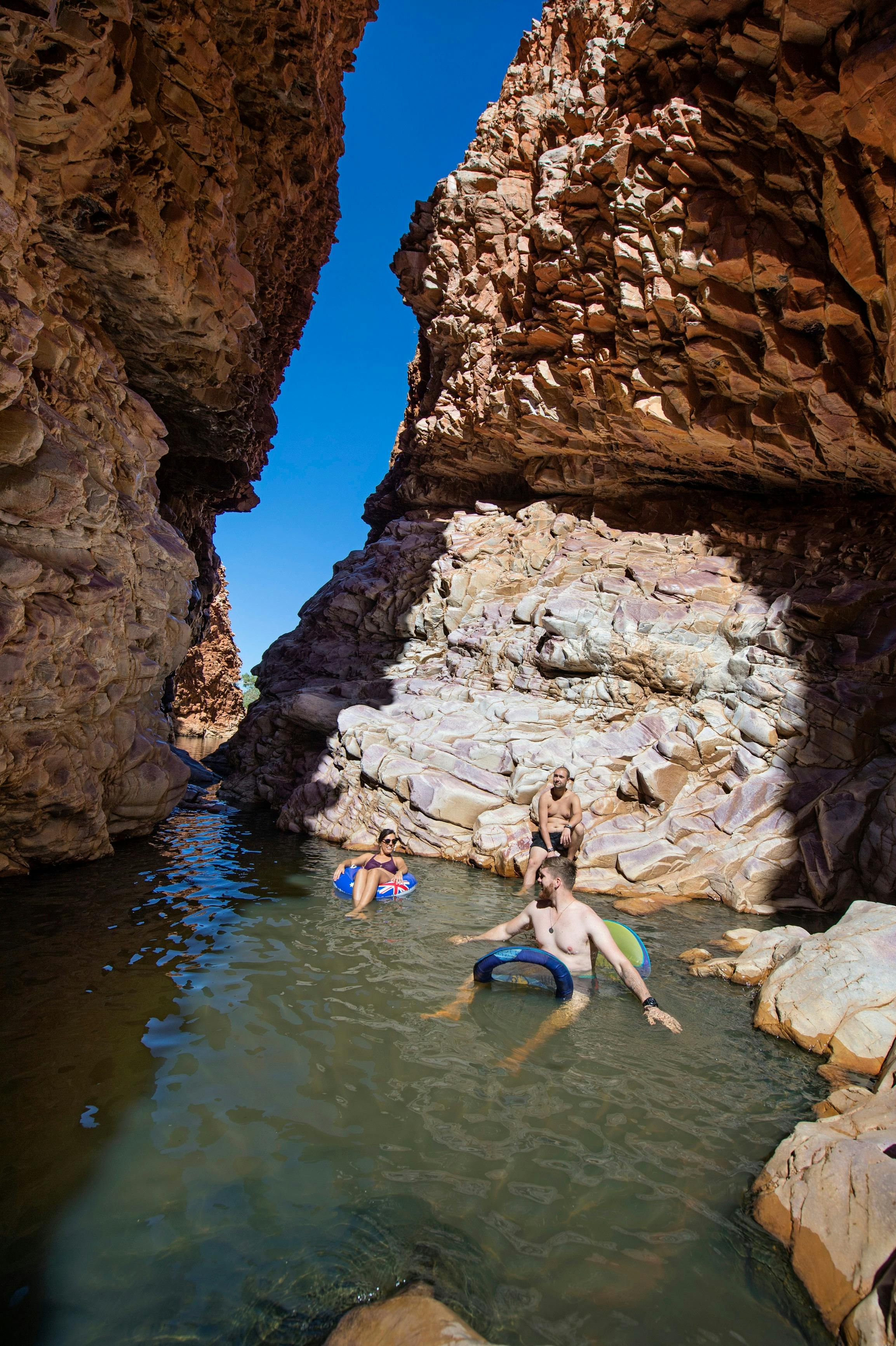 Friends swimming at Redbank Gorge