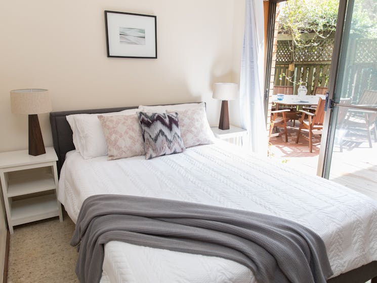 Taranaki Beach House |opposite Town Beach - 2nd Bedroom opening out onto courtyard