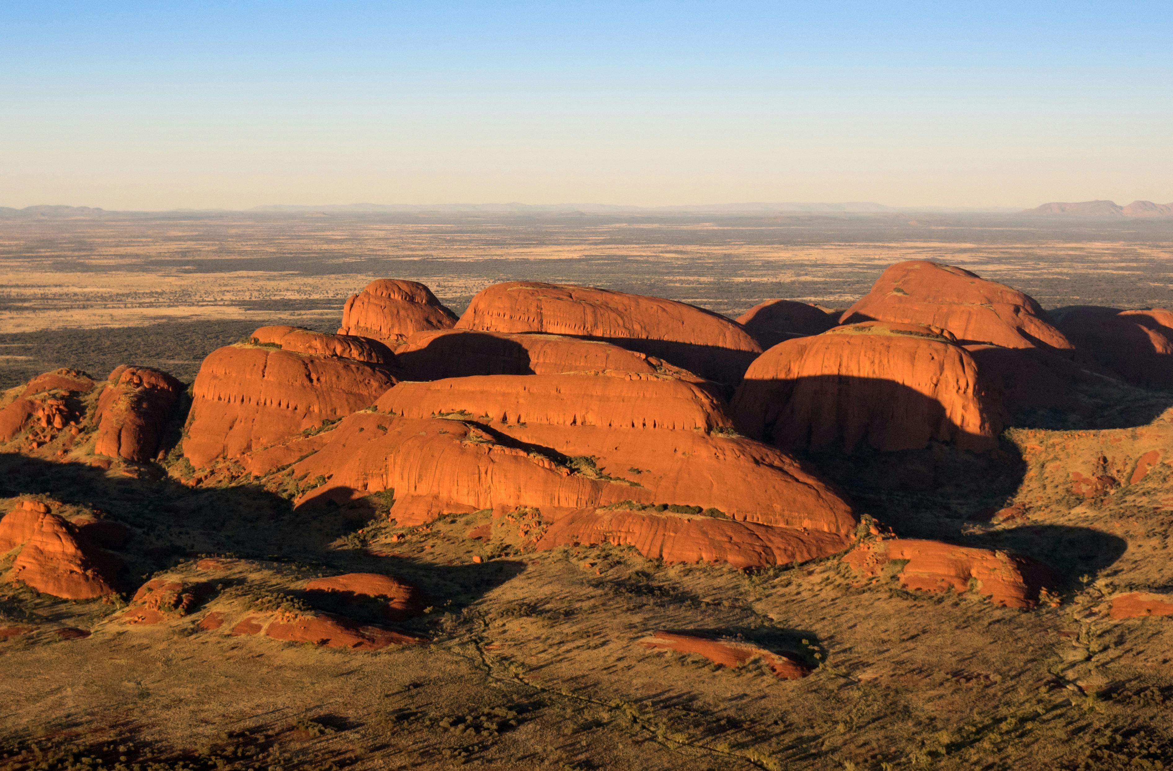 multiple large red rocks taken from the air