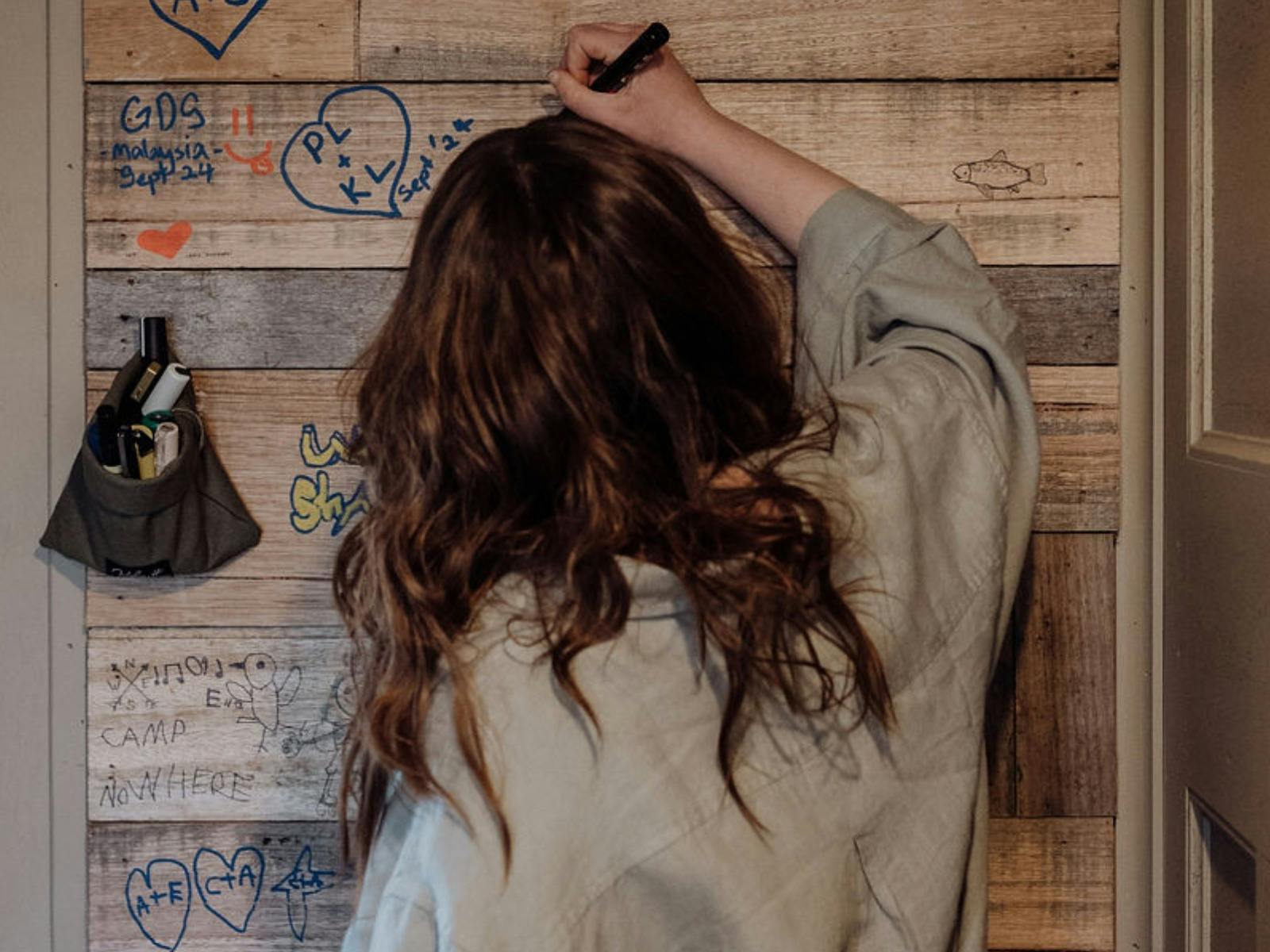 Graffiti wall in Camp for guests to sign and leave a message