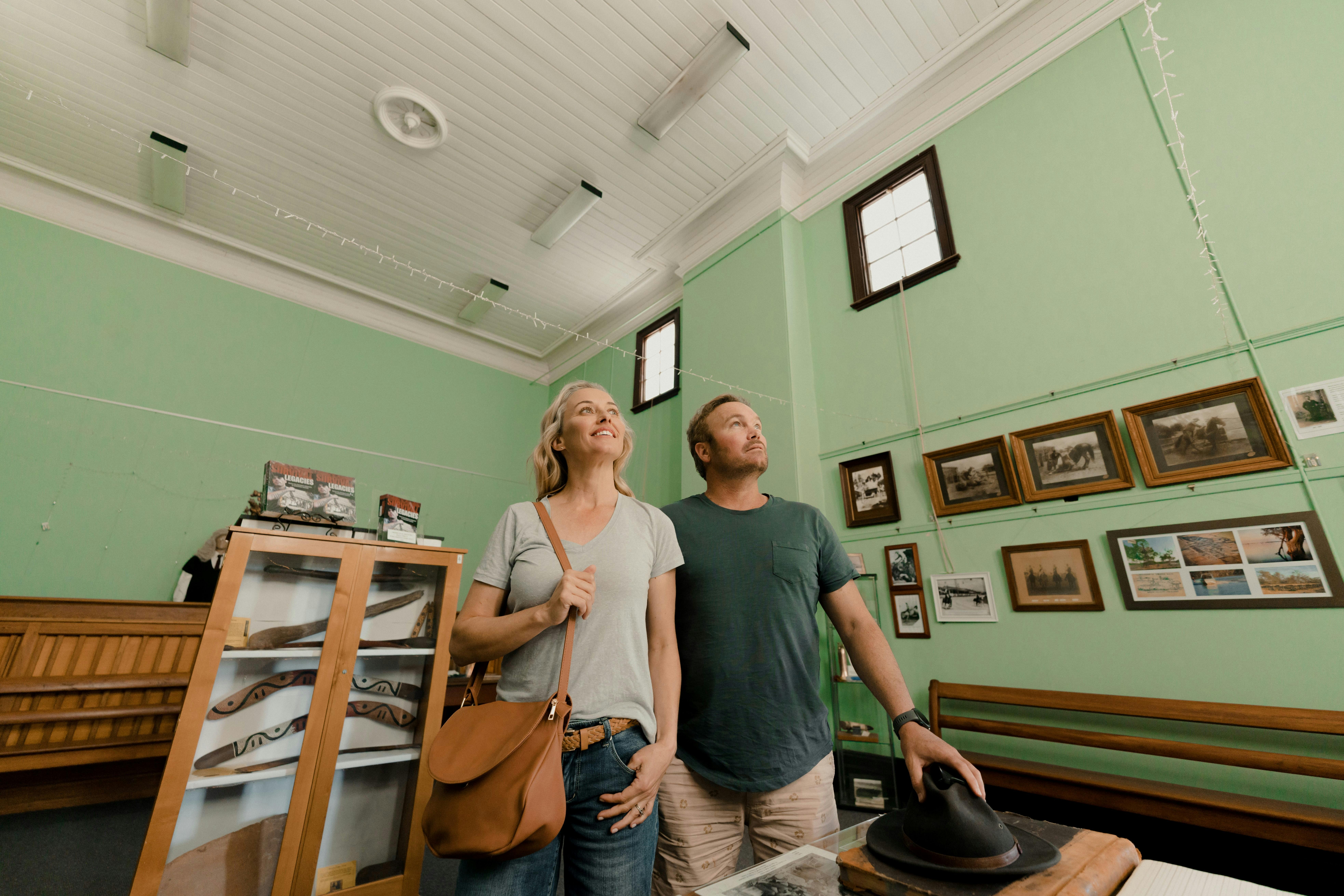 couple exploring the history artifacts of the Urana Courthouse Museum